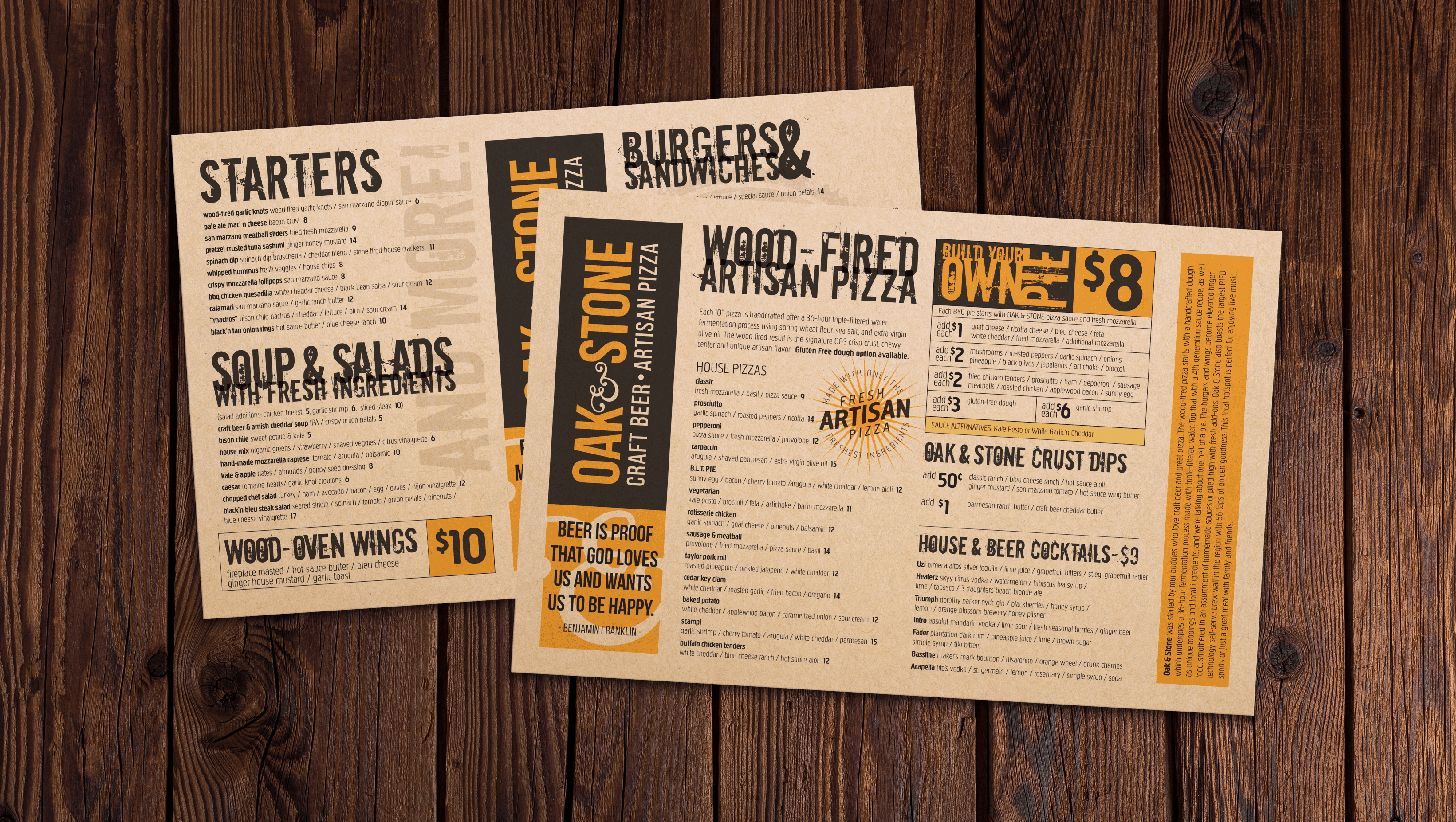 Oak and Stone menus on a wooden table